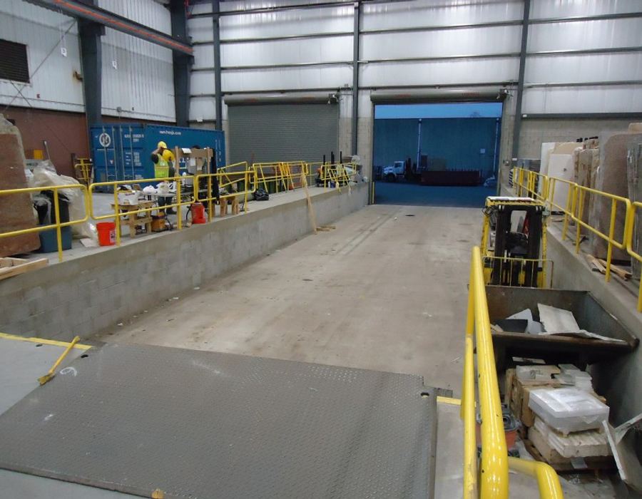 Warehouse loading dock with forklift